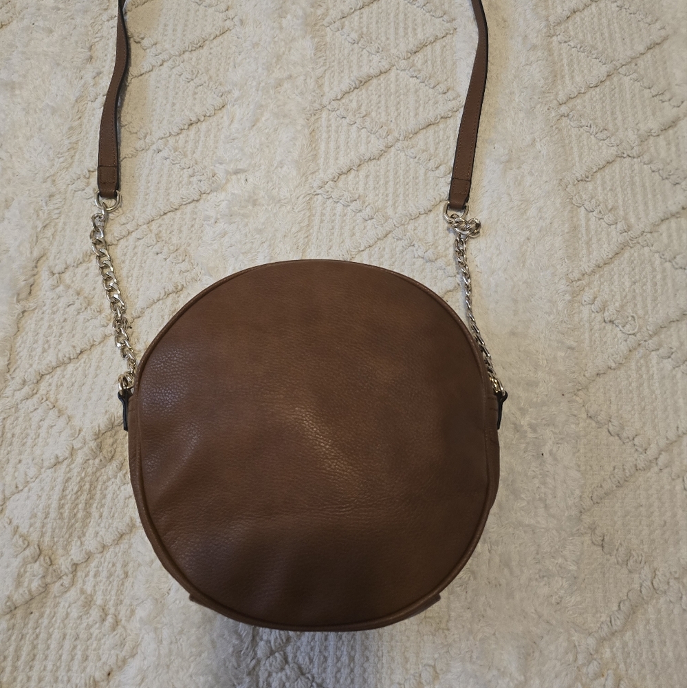 Round brown leather crossbody bag w/gold chain detail on straps